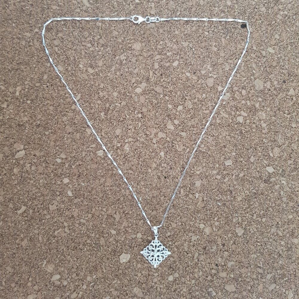 Sterling silver necklace with filigree pendant